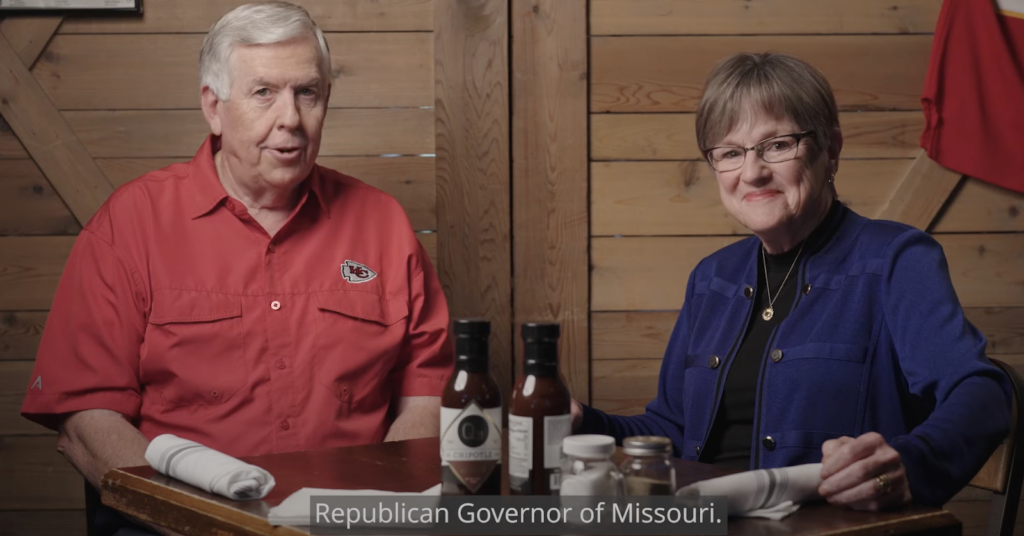 Governors Mike Parson (R-MO) and Laura Kelly (D-KS) model “disagreeing better” and talking sports teams in a nationally promoted public service announcement